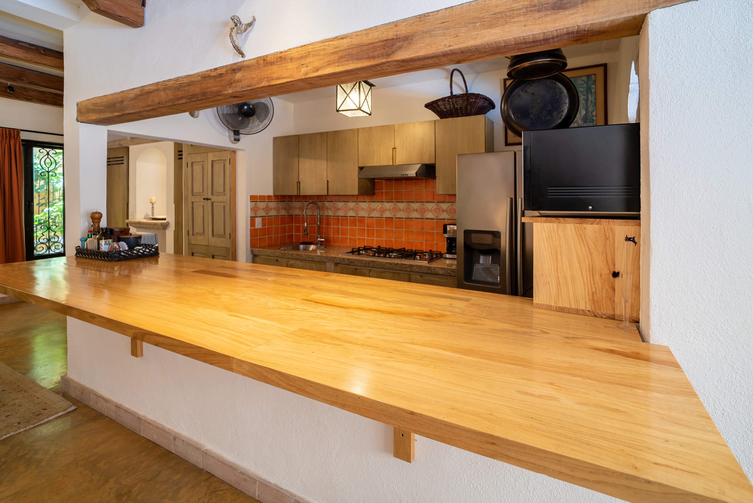 kitchen with large wood bar